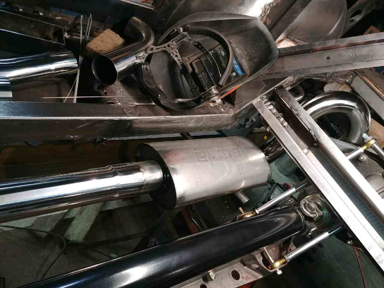 Name:  Fabbing the exhaust system starboard side.jpg
Views: 713
Size:  116.3 KB