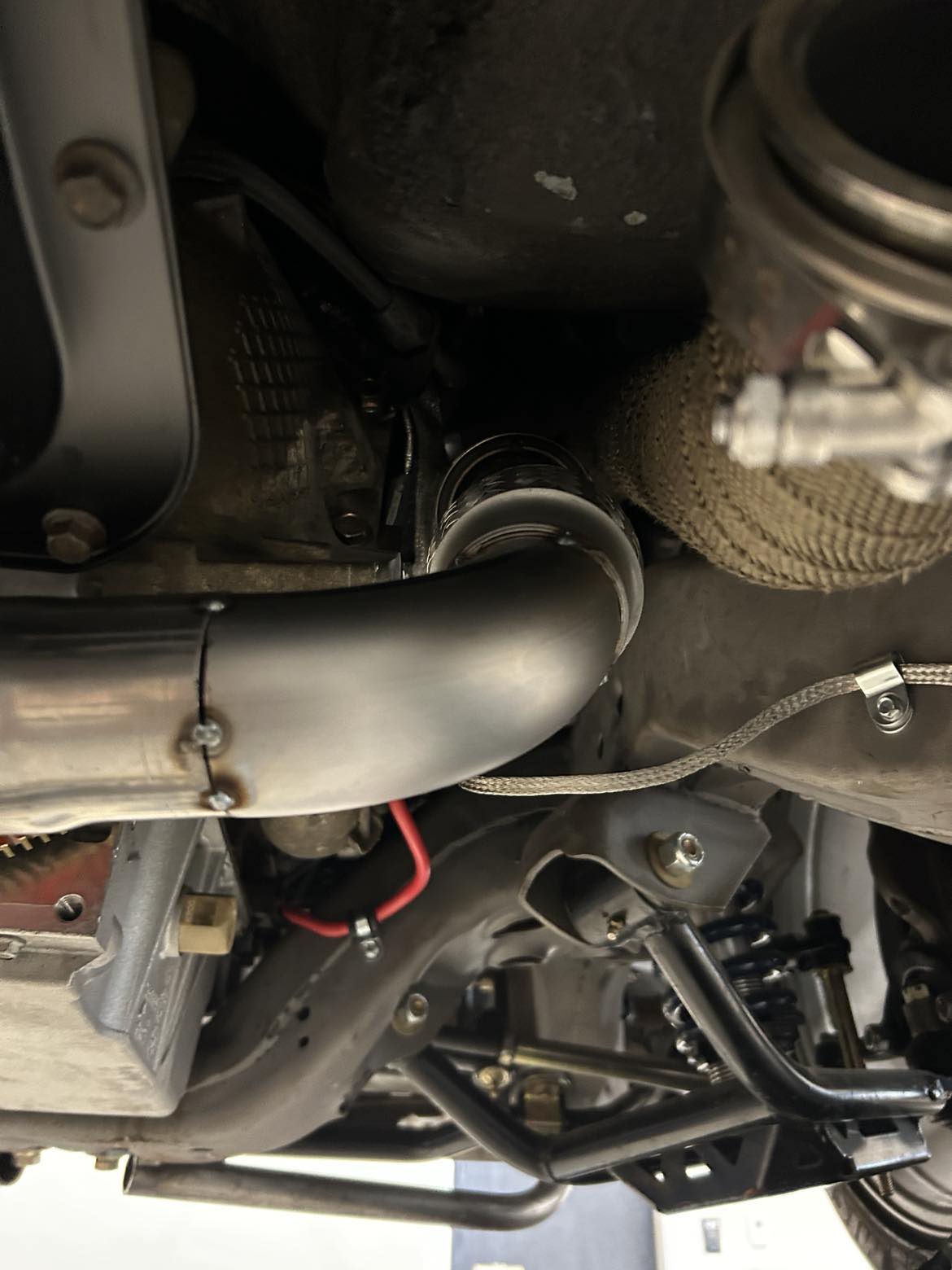 Name:  passenger side exhaust crossover ear cut off.jpg
Views: 370
Size:  124.8 KB