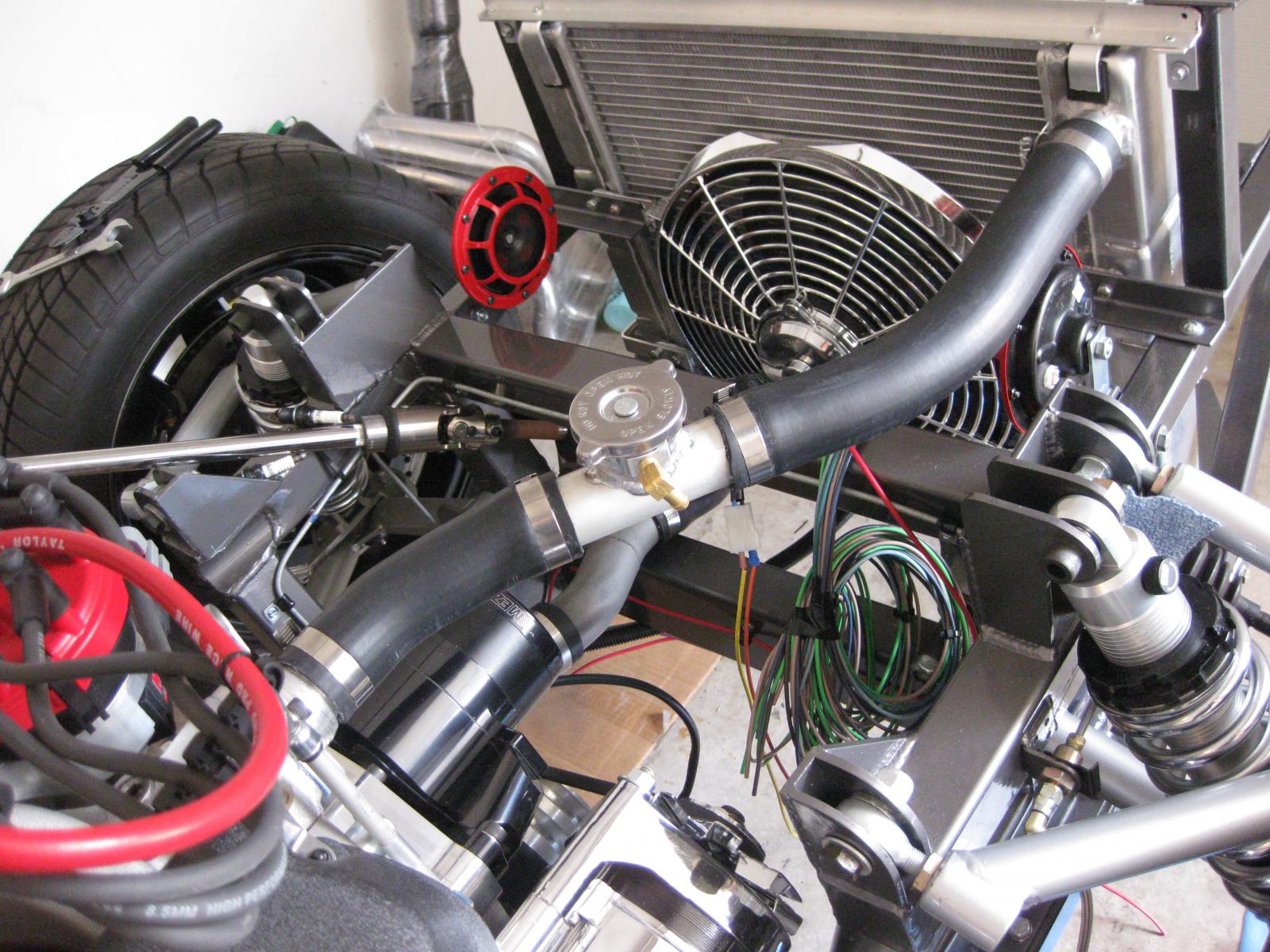 Name:  Radiator hose fan mock.jpg
Views: 5034
Size:  290.8 KB