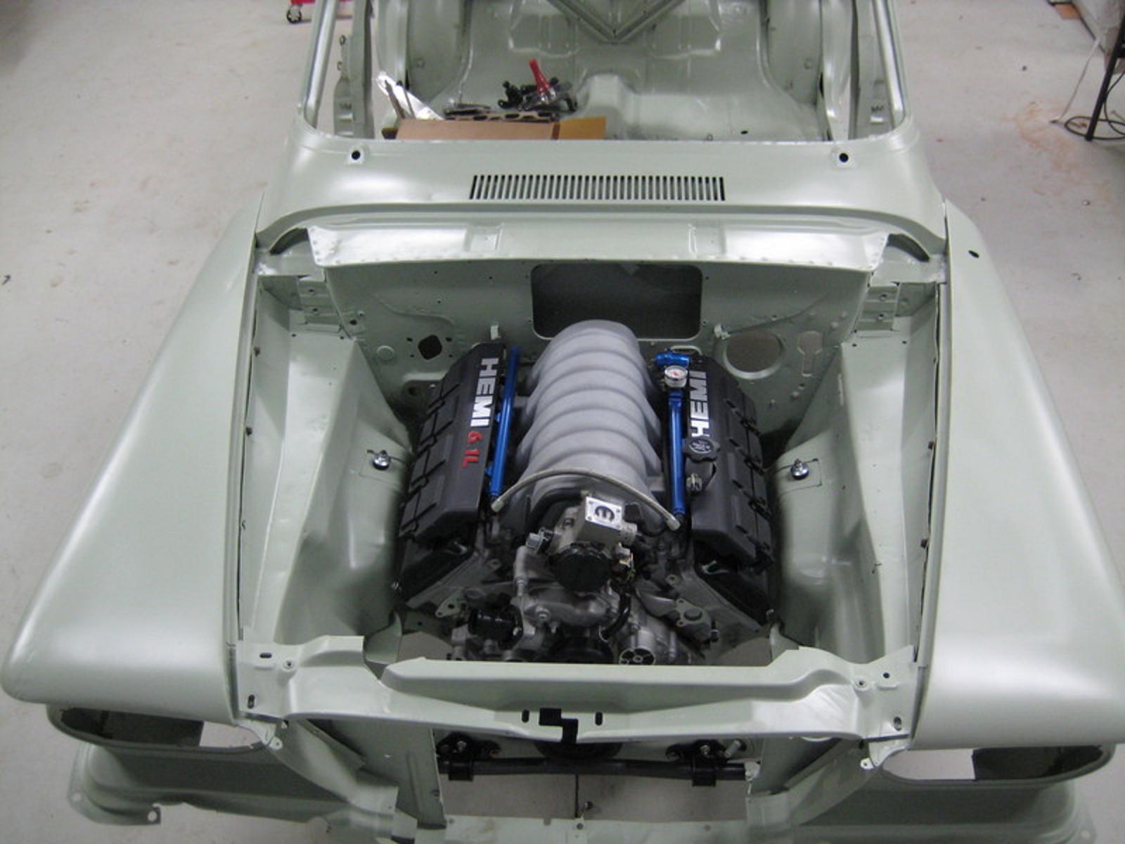 Name:  62 valiant 6.1 hemi.jpg
Views: 4465
Size:  144.8 KB